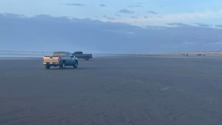 police truck on beach