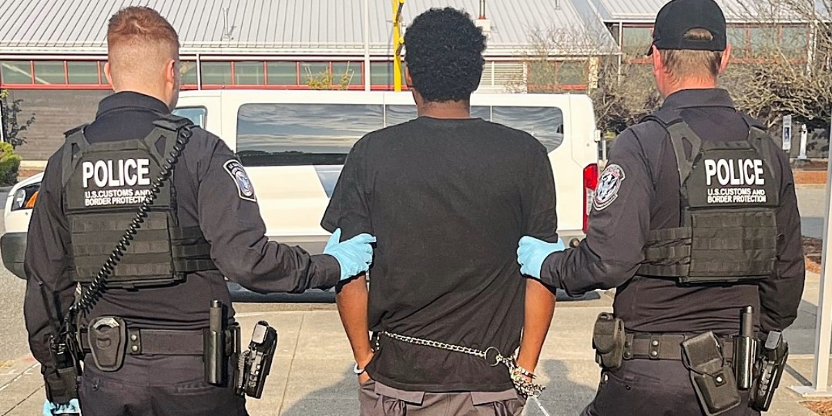 CBP escort arrested individual