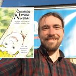 Zachary Robertson Bellingham author charged child pornography 2026 Facebook photo