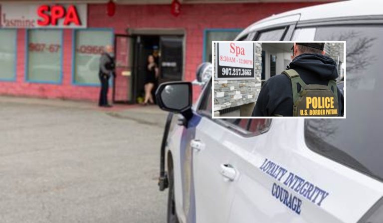 An Alaska State Trooper patrol vehicle is parked outside Jasmine Spa during a search