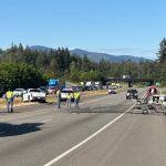 Emergency crews investigate a fatal four-vehicle collision on State Route 18 near Southeast 231st Street and the SR 169 interchange in Maple Valley on Thursday, May 21, 2026. One person died and three others were injured after a vehicle crossed the median into opposing traffic.