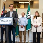 Washington Gov. Bob Ferguson speaks alongside FEMA and local emergency management officials during a disaster assistance press conference in Renton on May 20, 2026, encouraging residents impacted by December flooding to apply for federal aid before the June 10 deadline.