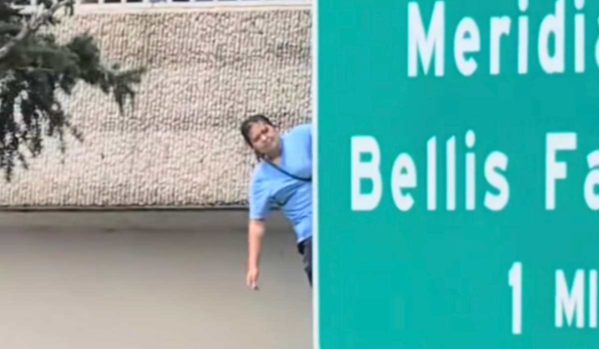Woman on sign