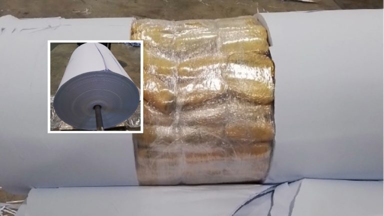 A CBSA opium seizure at Delta's Tsawwassen Container Examination Facility uncovered 520.6 kilograms of opium hidden inside industrial paper rolls.