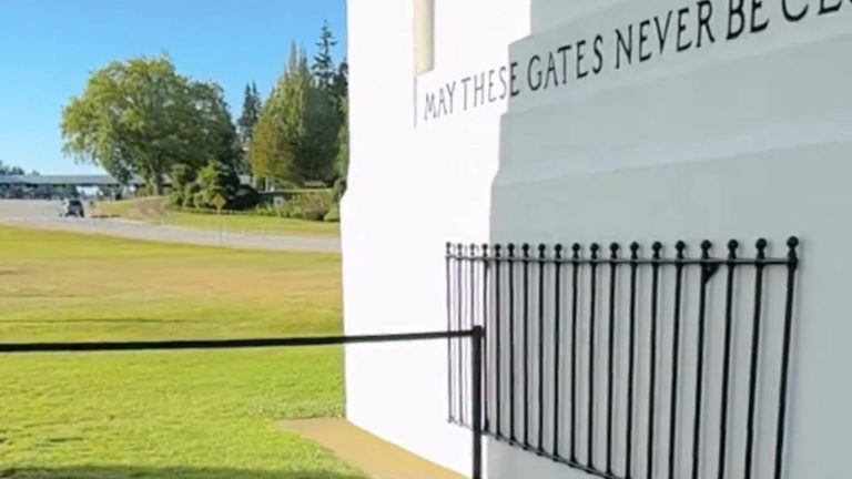 A temporary barrier stretches across the Peace Arch Monument at Peace Arch Historical Park in Blaine, dividing the international park ahead of the 2026 FIFA World Cup. Officials on both sides of the border have implemented additional security measures as Seattle and Vancouver prepare to host tournament matches.