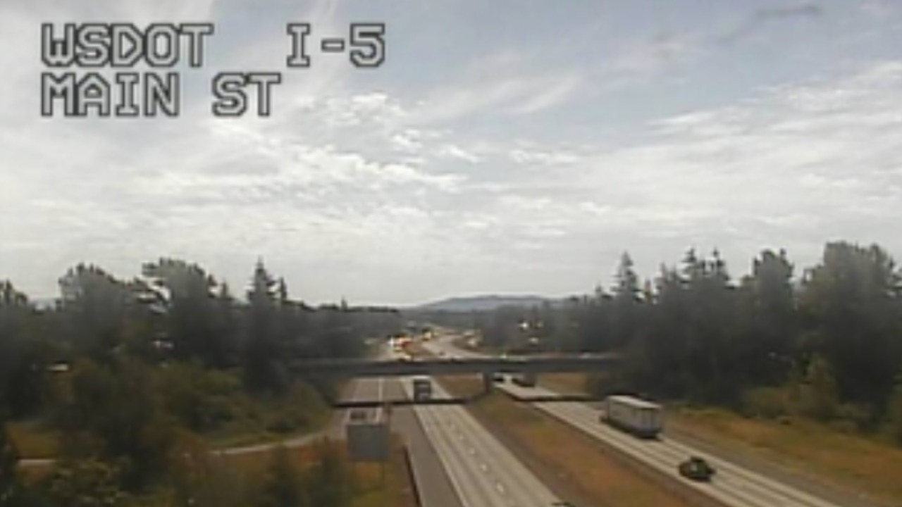 A suspected DUI driver was arrested after rolling a pickup truck towing a fishing boat on Interstate 5 near Ferndale. The crash blocked lanes and caused major traffic delays.