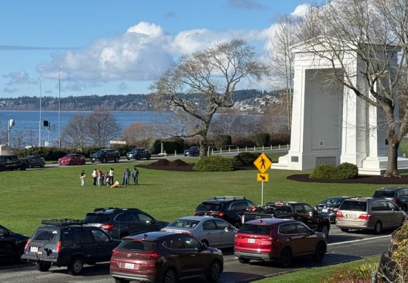 Visitors enjoy a sunny afternoon at Peace Arch Historical State Park in Blaine. The Peace Arch Monument, dedicated in 1921 as a symbol of friendship between the United States and Canada, overlooks Boundary Bay.