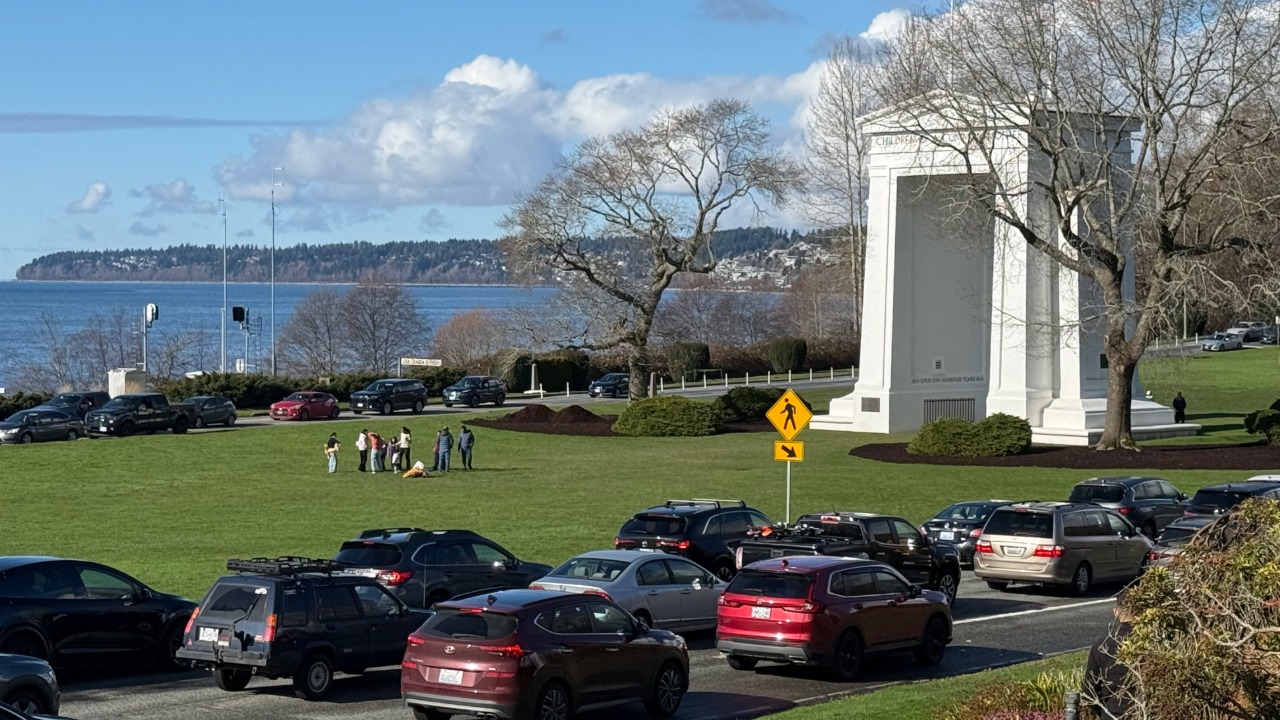 Visitors enjoy a sunny afternoon at Peace Arch Historical State Park in Blaine. The Peace Arch Monument, dedicated in 1921 as a symbol of friendship between the United States and Canada, overlooks Boundary Bay.