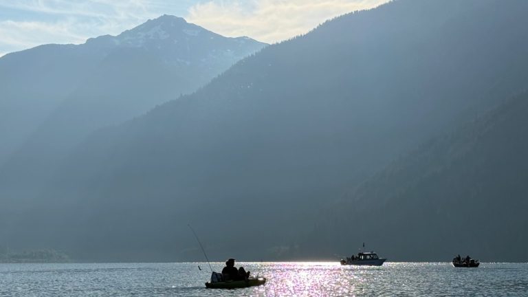 A noticeable layer of haze stretched across Baker Lake as smoke from active wildfires burning in eastern Washington drifted west into the Cascades.