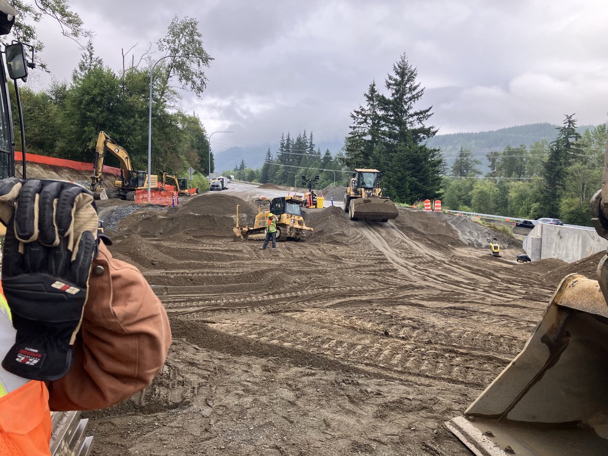 Crews rebuild the I-5 roadbed near Alger above the new fish passage structure