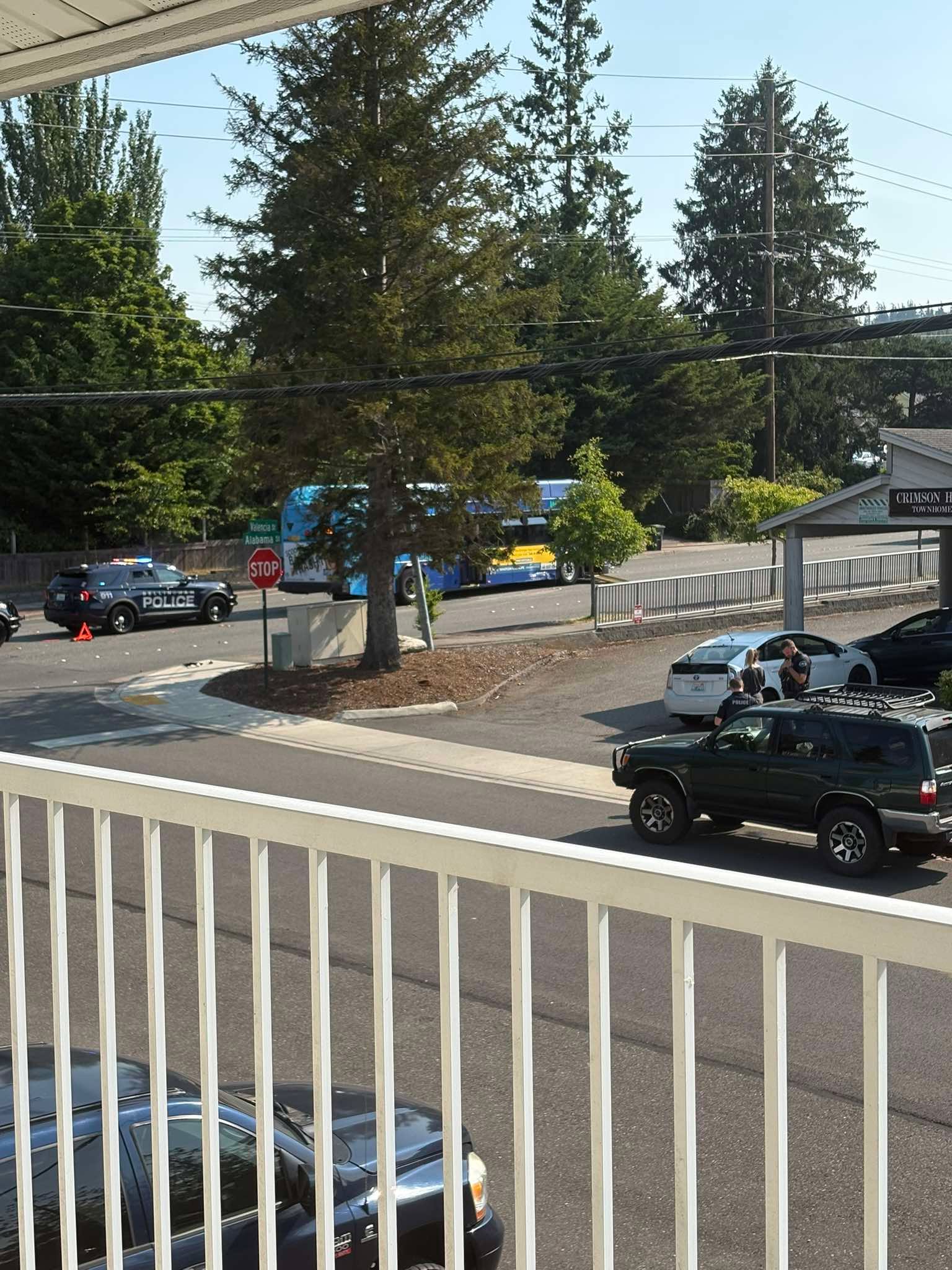 Bellingham Police respond to the scene of a crash between a car and a WTA bus