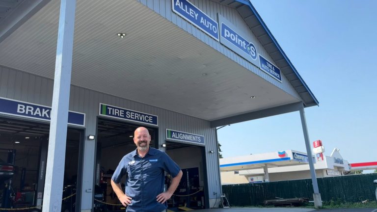 Rich, owner of Alley Auto Point S Tire & Auto Service in Blaine, stands outside the shop ahead of the back-to-school rush.