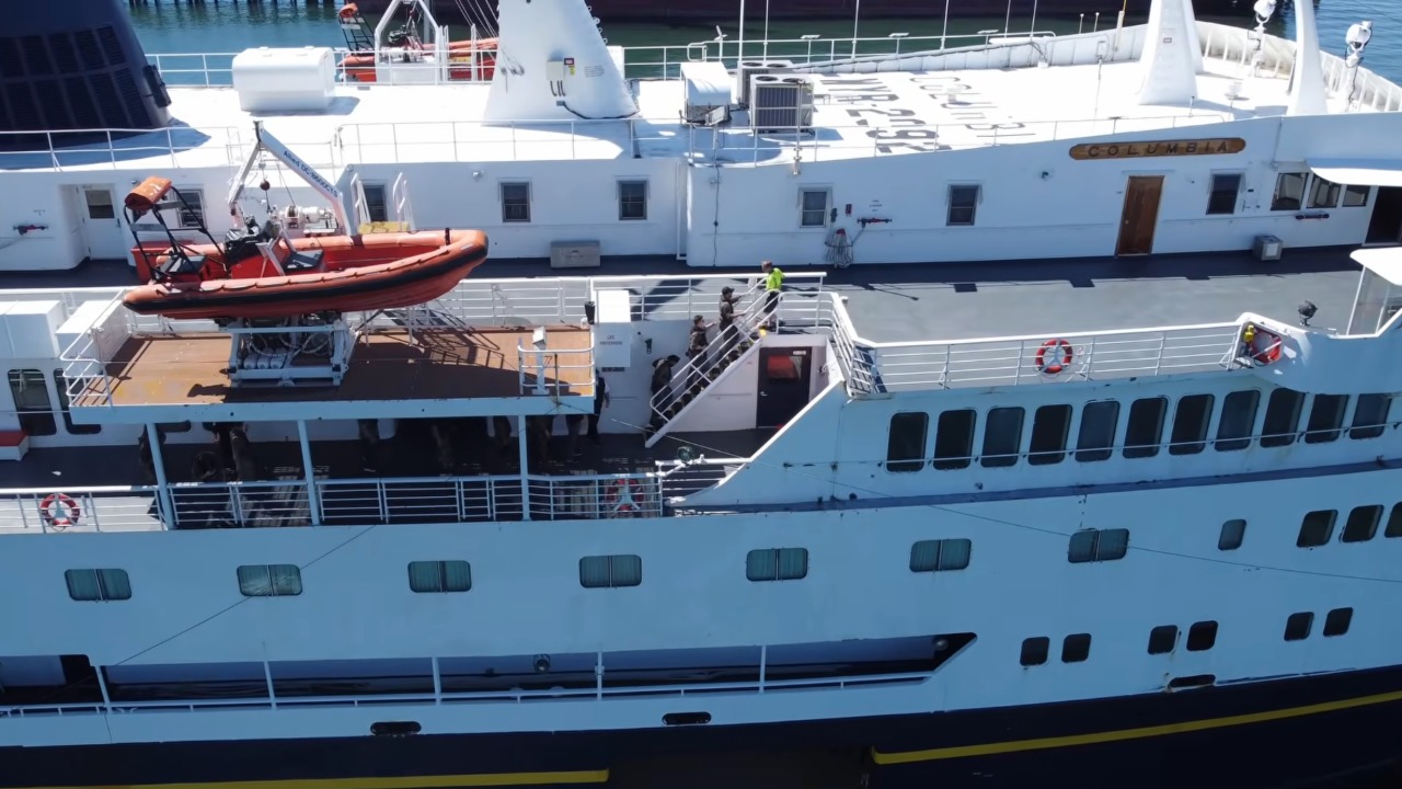 Bellingham SWAT officers train aboard a Washington State Ferries vessel with the U.S. Coast Guard