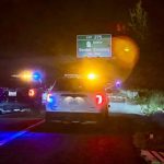 Blaine Police and Washington State Patrol vehicles block northbound I-5 near Exit 275 as pallets sit along the shoulder Monday night.