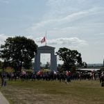 Fire trucks flanked the Peace Arch with American and Canadian flags as crowds gathered on both sides of the border for the 25th anniversary ceremony.