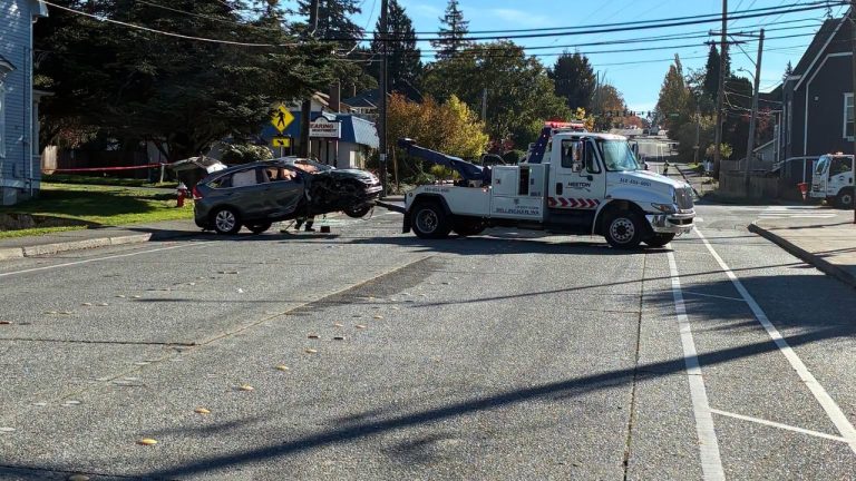 A rollover crash sheared a power pole at Ellis and Gladstone streets in Bellingham, prompting road closures as PSE crews make repairs.