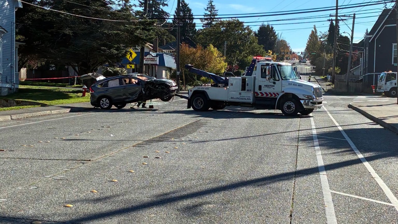 A rollover crash sheared a power pole at Ellis and Gladstone streets in Bellingham, prompting road closures as PSE crews make repairs.