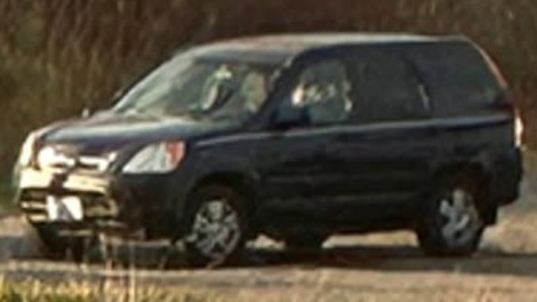 Everson Police Department released this photo of a dark blue or black 2002–2004 Honda CR-V, with a distinctive white stripe, believed to have been driven by the female suspect in the Oct. 22 assault.