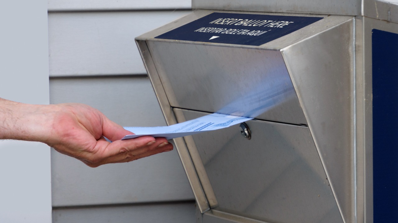 Law enforcement intercepted a letter containing white powder addressed to Washington's Secretary of State elections division Thursday.
