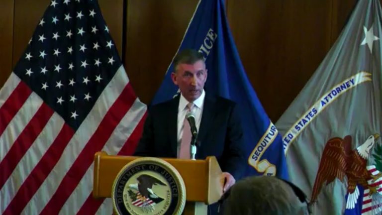 Acting U.S. Attorney Neil Floyd announces findings from Washington’s voter citizenship investigation during a press conference on Oct. 26.